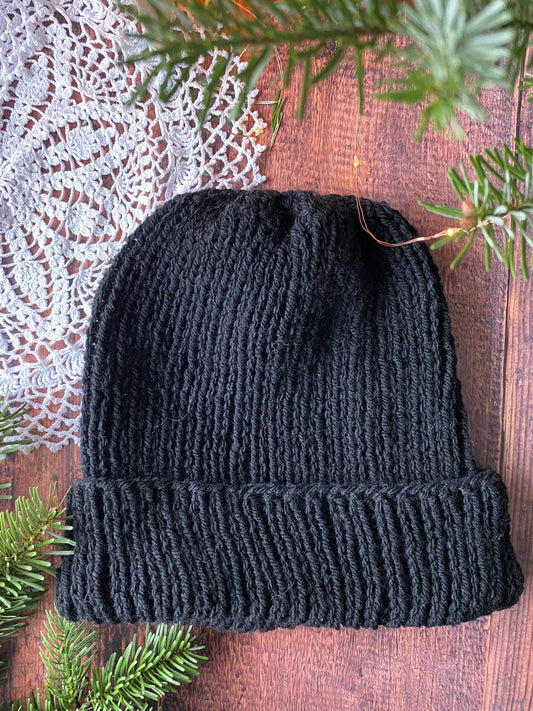 Bonnet en tricot noir blanc rouille
